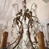 Old cage chandelier. Bronze and tassels. 6 arms of lights.