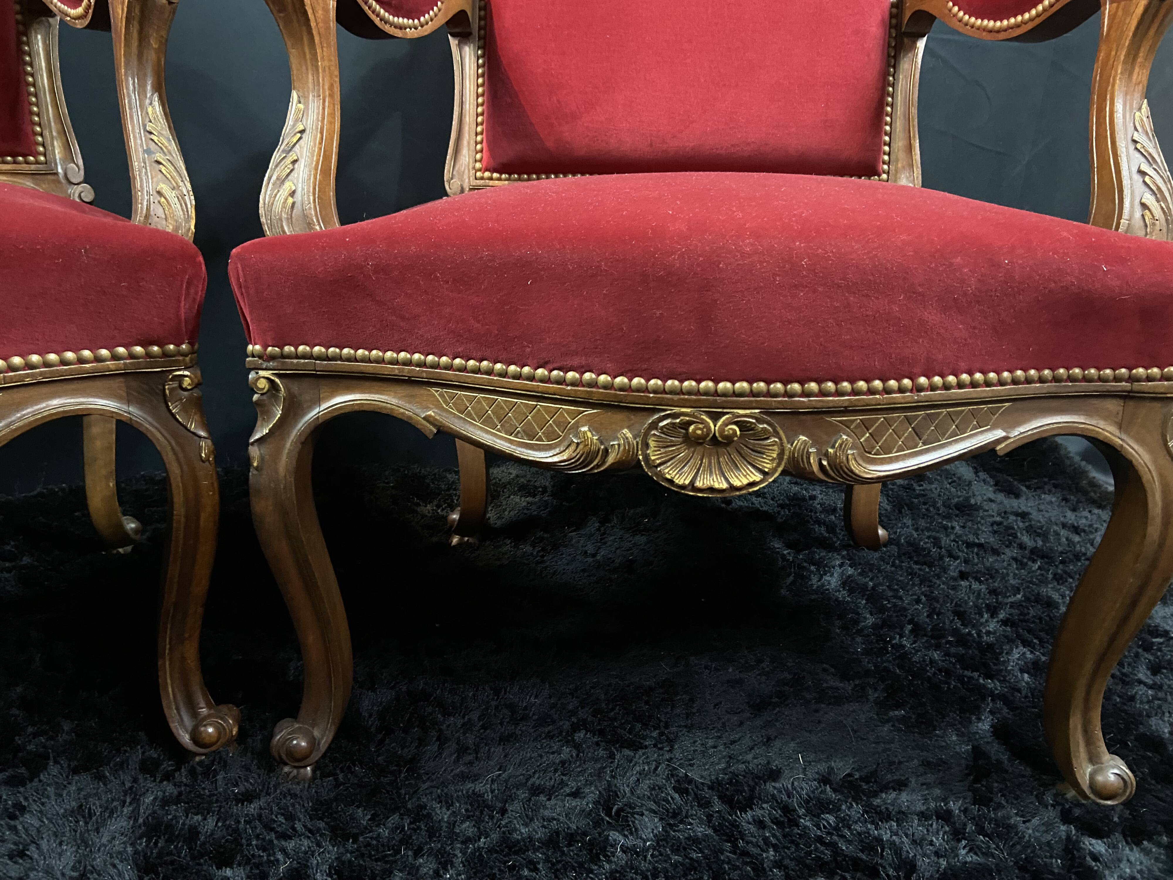 Pair of flat-back armchairs in Louis XV style in red velvet.