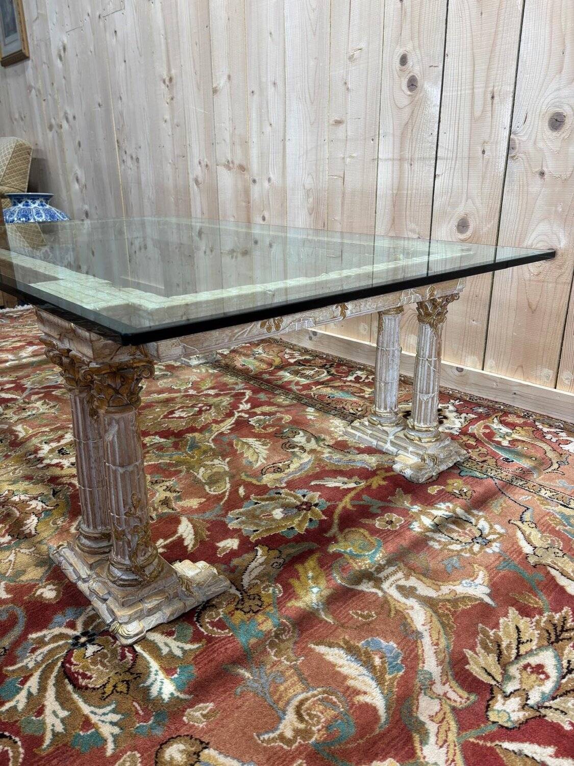 Coffee table with Corinthian columns and glass top