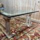 Coffee table with Corinthian columns and glass top