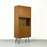 Narrow teak bookcase with two doors by Omann Jun, 1970s