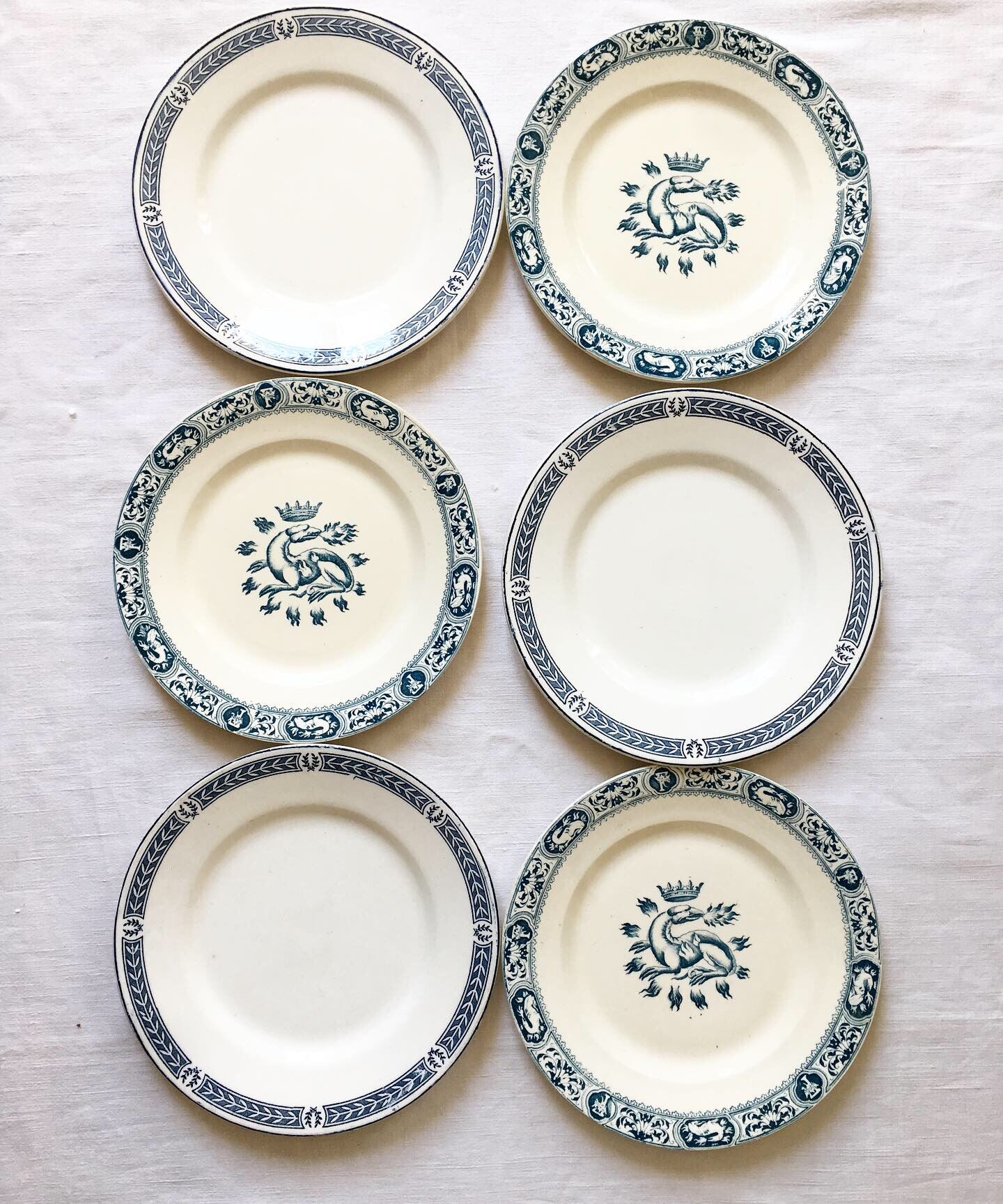6 mismatched Iron Land dessert plates
