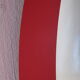 Vintage red round plastic mirror from the 1960s.
