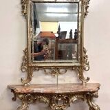 Important console table with a curved shape + Louis XV style mirror in gilded and silvered wood.