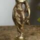 Paire de bougeoirs en bronze, porteuses d’eau