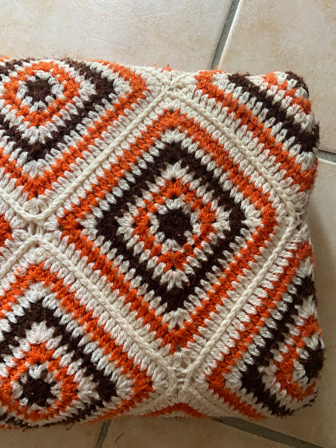 Orange and brown crochet throw