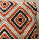 Orange and brown crochet throw