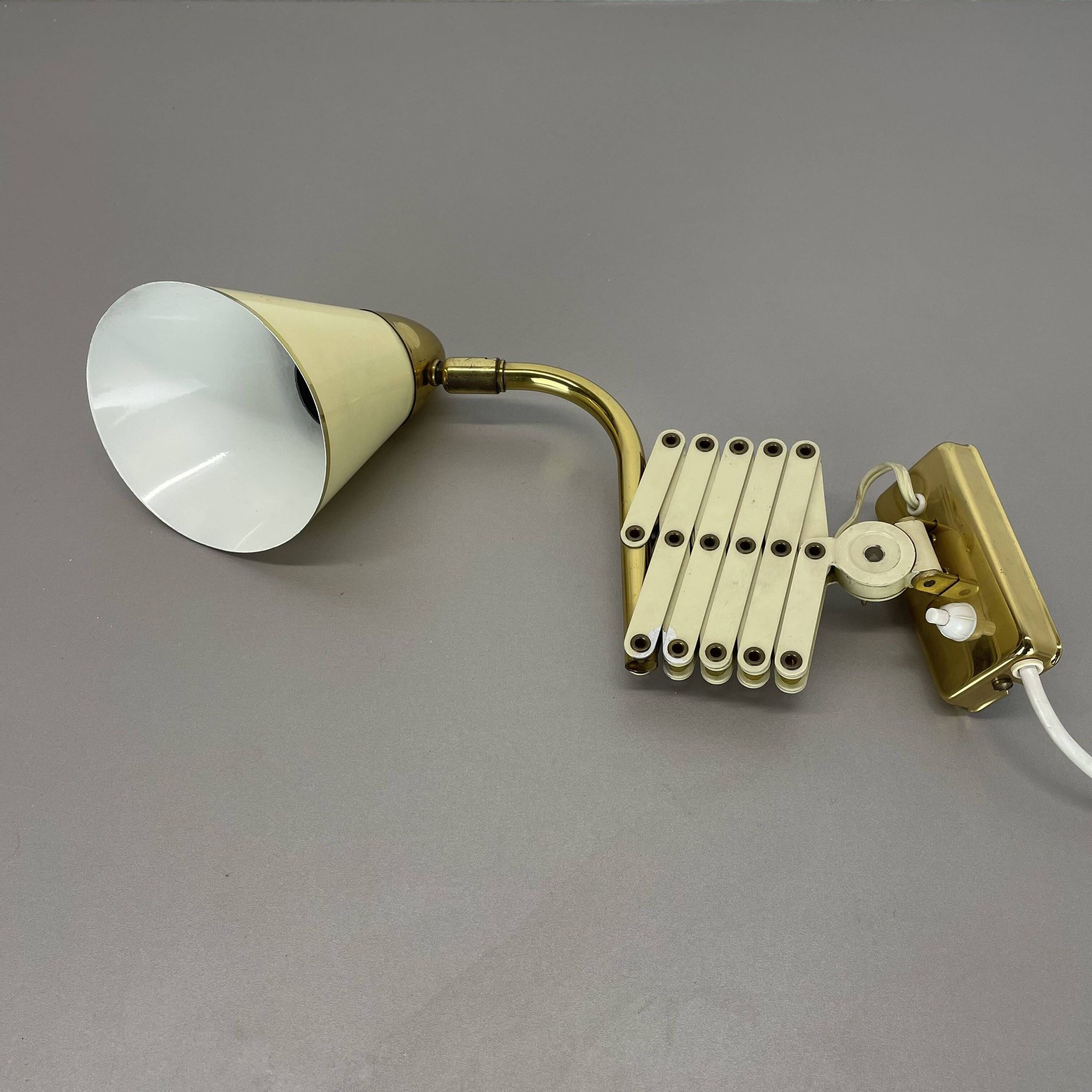 Original brass and metal scissors wall light by SIS Leuchten, Germany, 1950s.