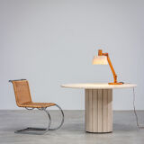 Circular modernist dining table in travertine 1970