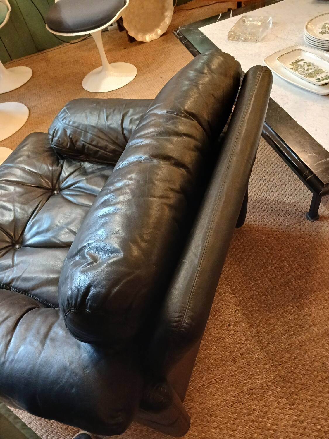 Pair of designer leather armchairs by Tobia Scarpa