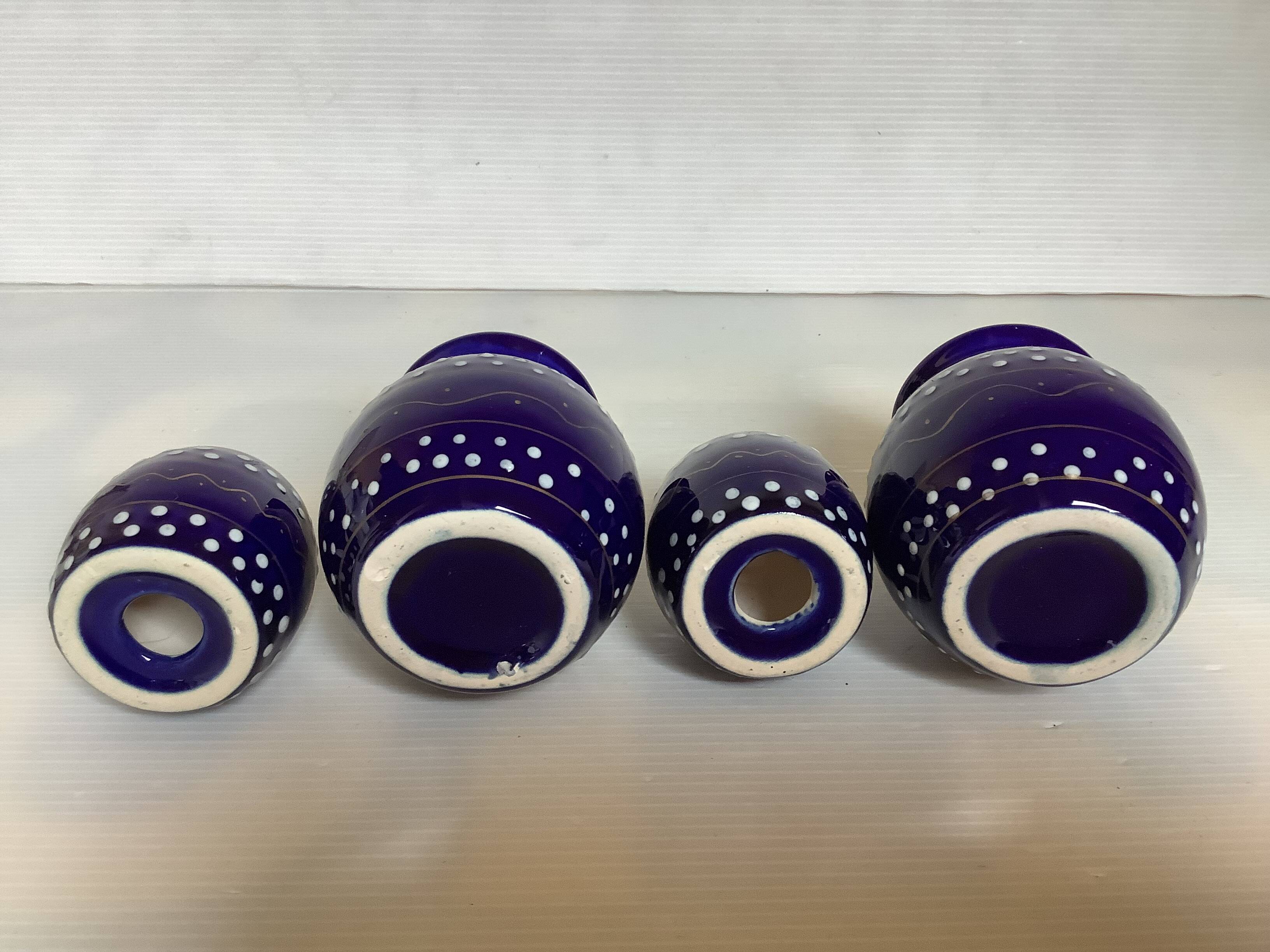 Pair of small enamelled cobalt blue candlesticks and vases