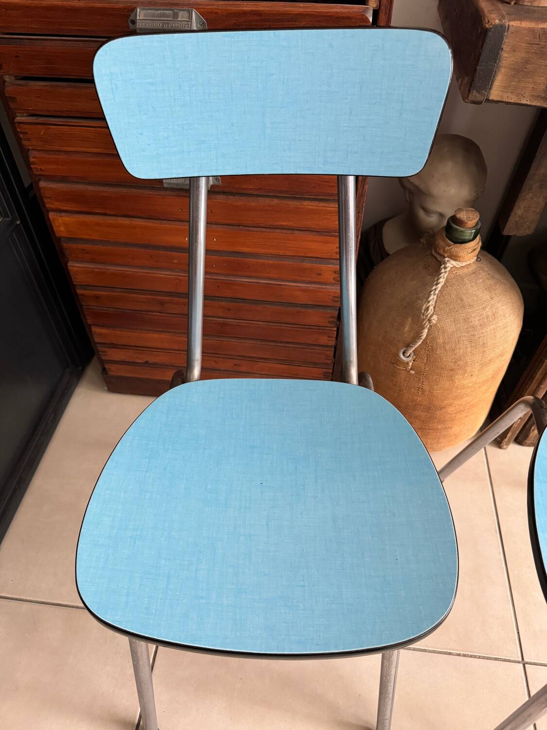 Pair of vintage blue Formica chairs