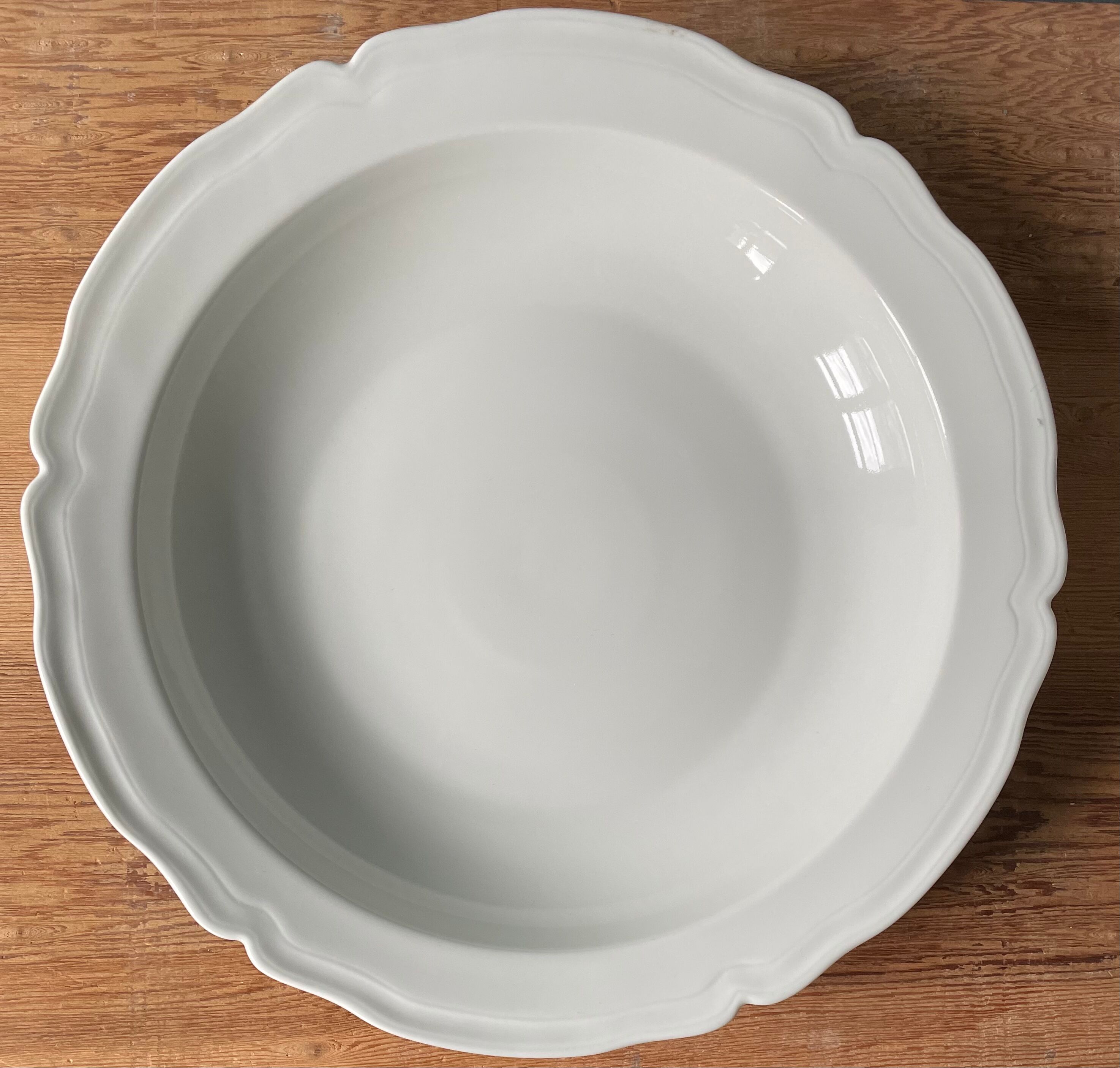 Old hollow round dish in Limoges porcelain