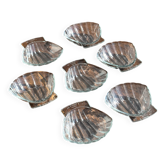 Set of 7 vintage Pyrex shell-shaped glass bowls.
