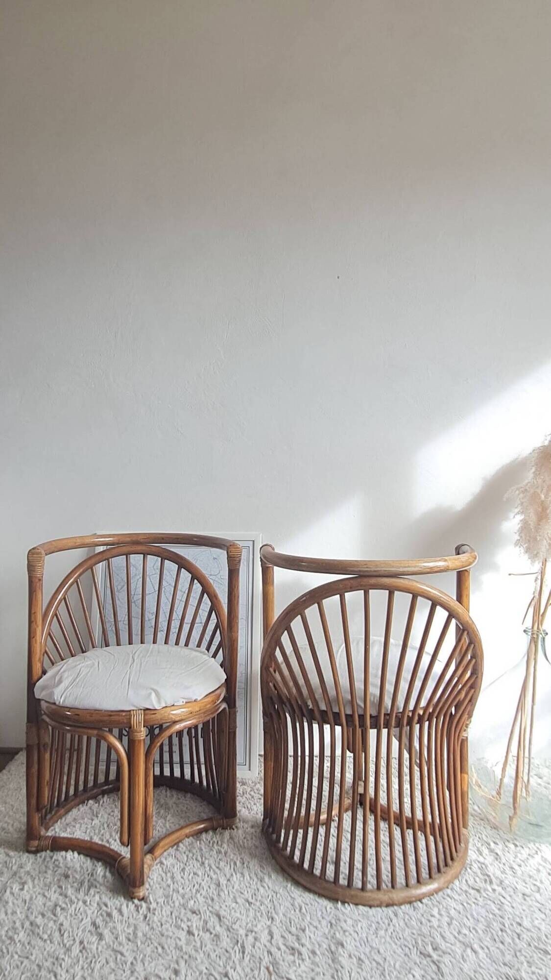 Pair of vintage rattan armchairs circa the 1960s.
