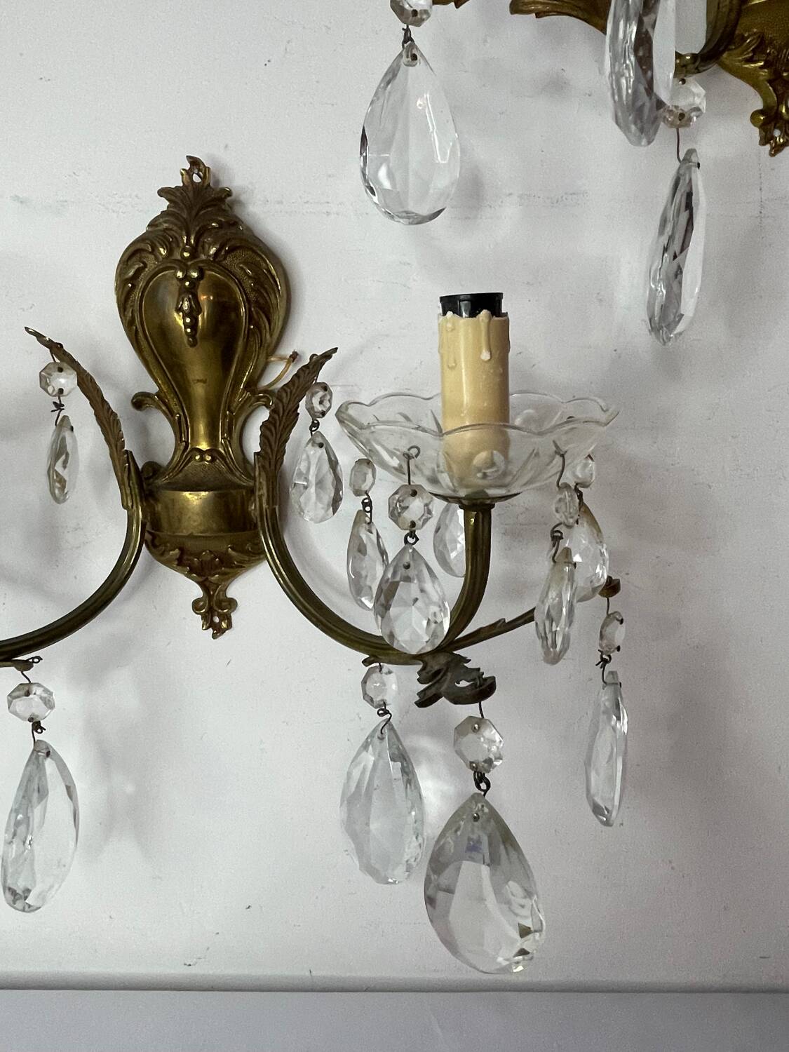 Pair of bronze and crystal wall lights