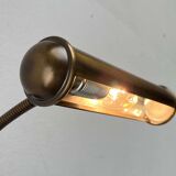 Vintage German brass patinated wall lamp with a gooseneck design by Honsel, 1970s.