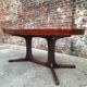 Large vintage Baumann table in rosewood with extensions, antique furniture.