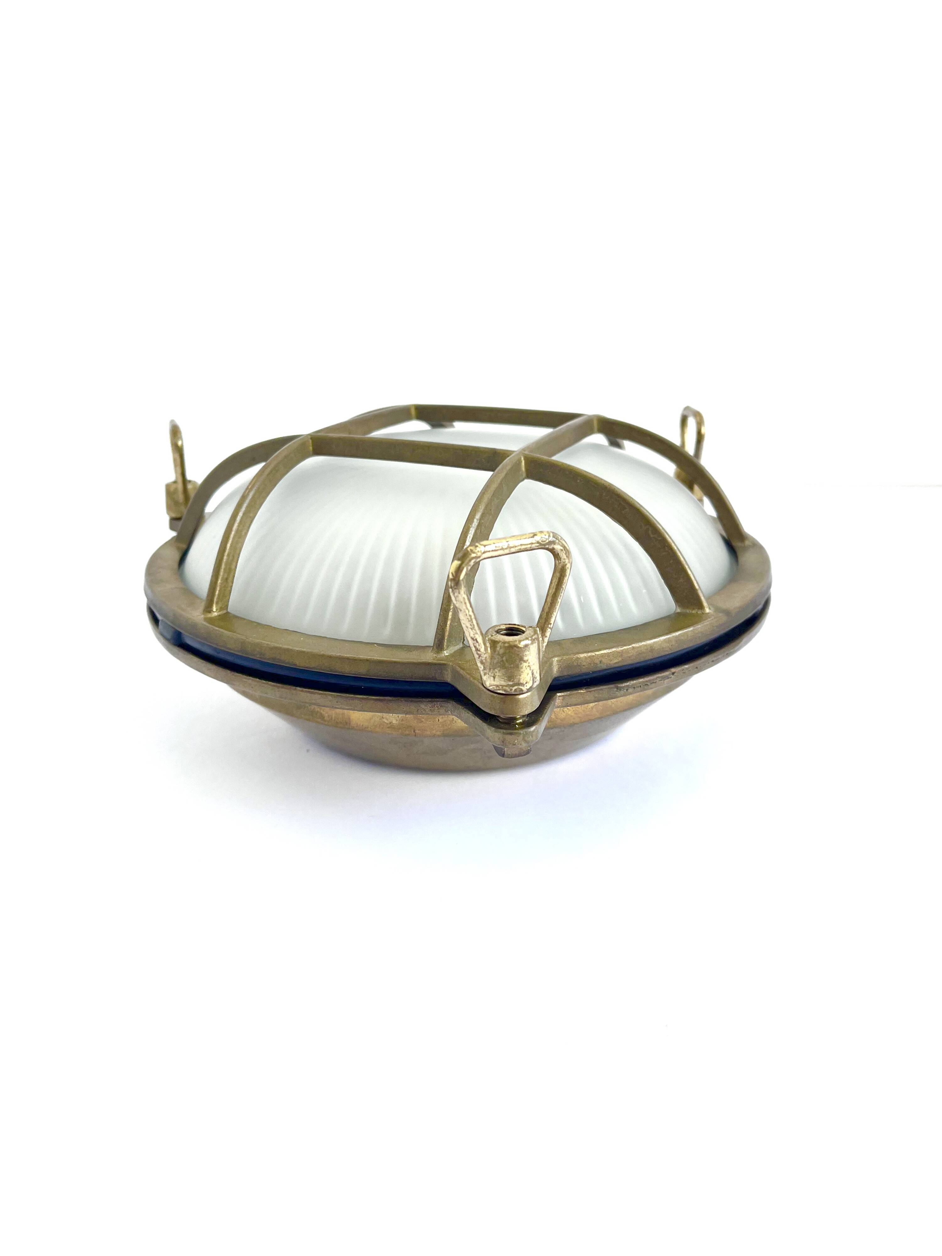 Marine decorative wall light in solid brass