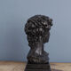David head in black waxed bean