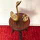Old tripod stool in solid wood
