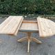 Extendable round dining table with central leg renovated in raw solid wood 105cm