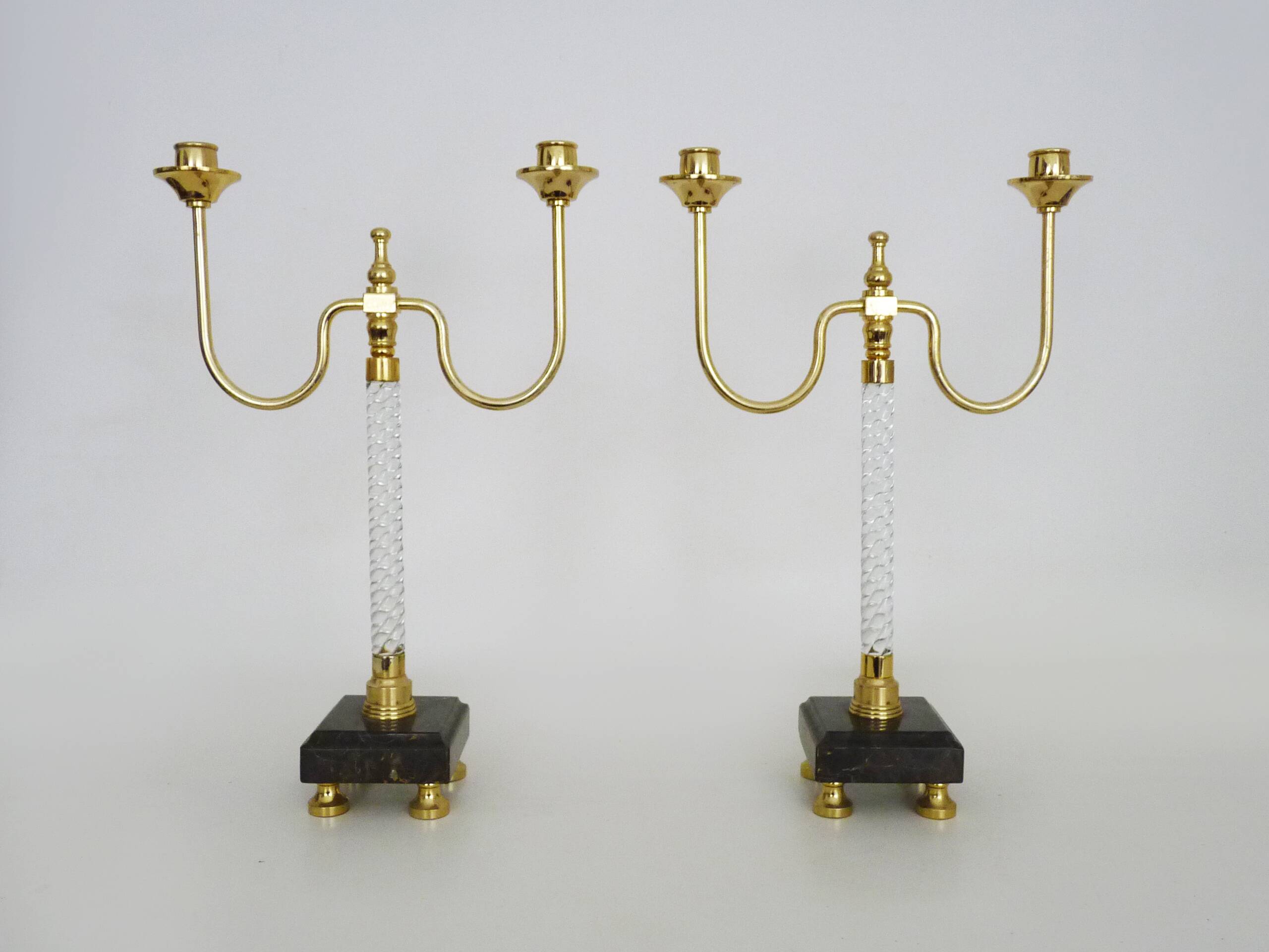 Pair of large candlesticks, Restoration style in brass, black marble, glass. 19th century