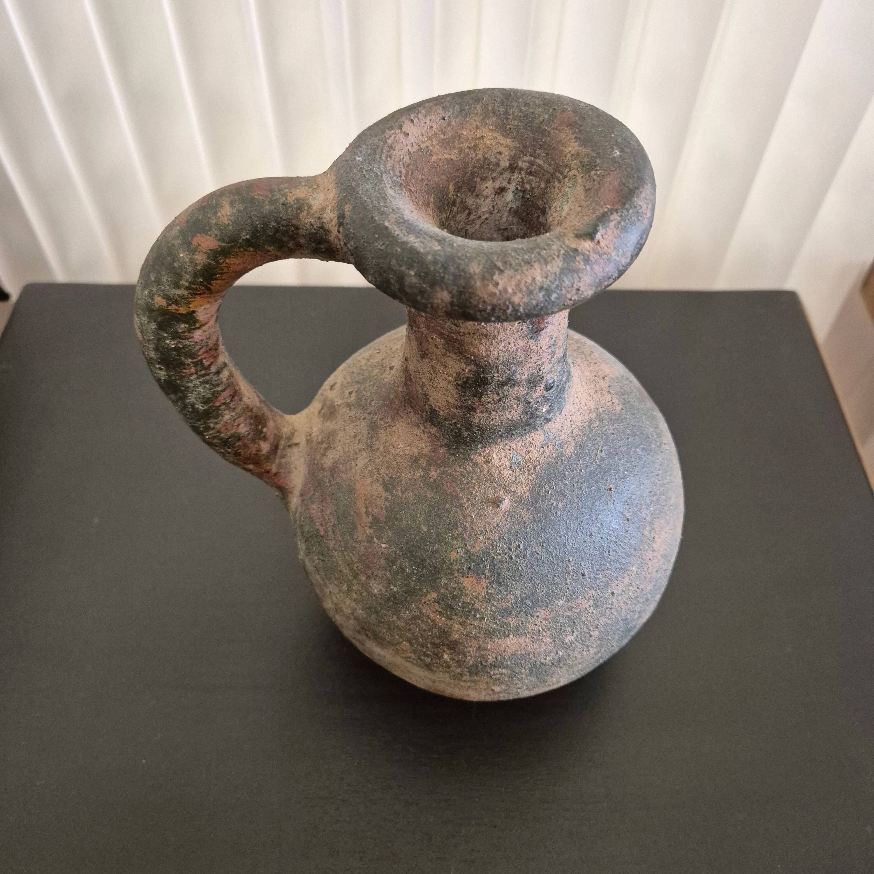 Ancient terracotta jug
