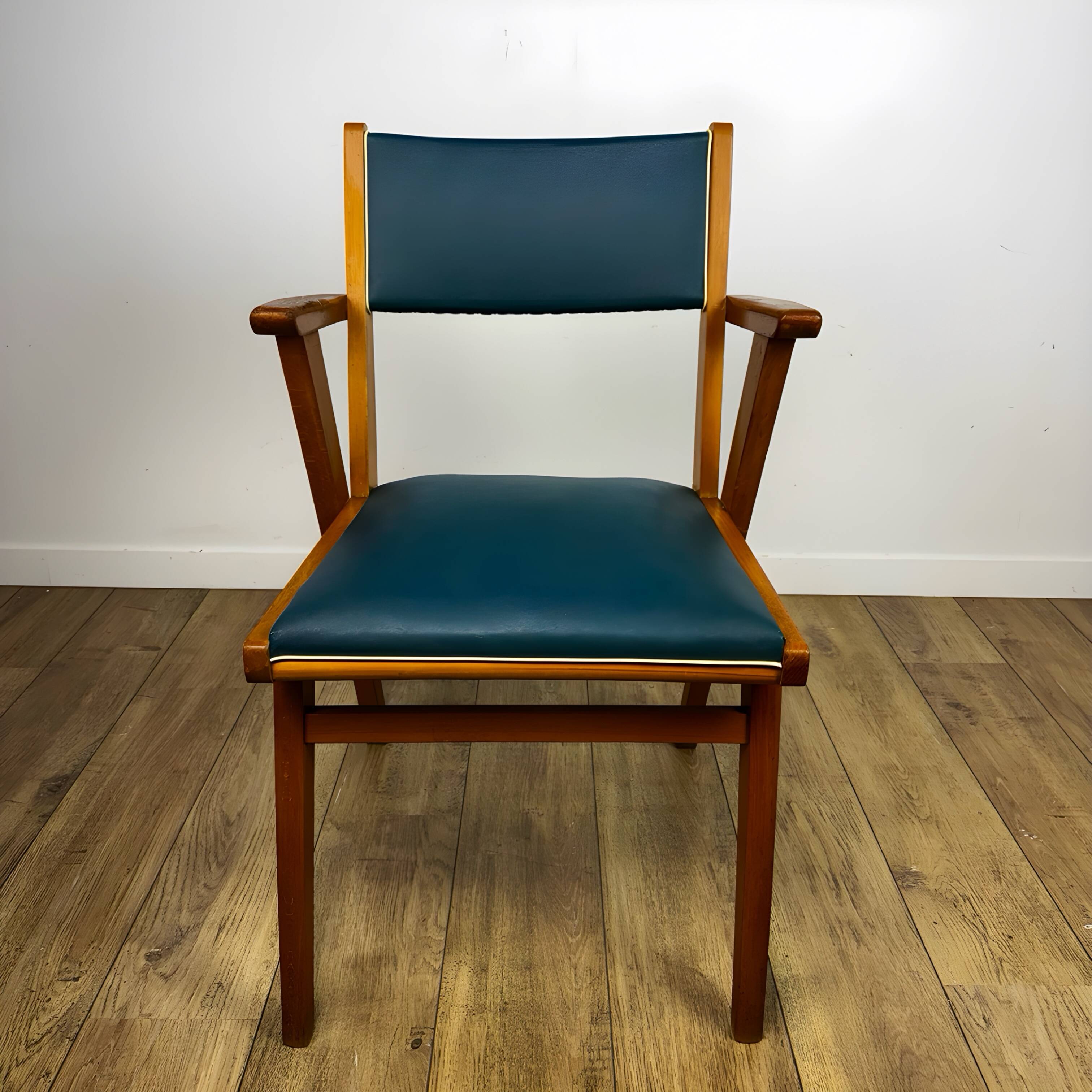 Pair of Scandinavian bridge armchairs in wood and vinyl from the 1950s.