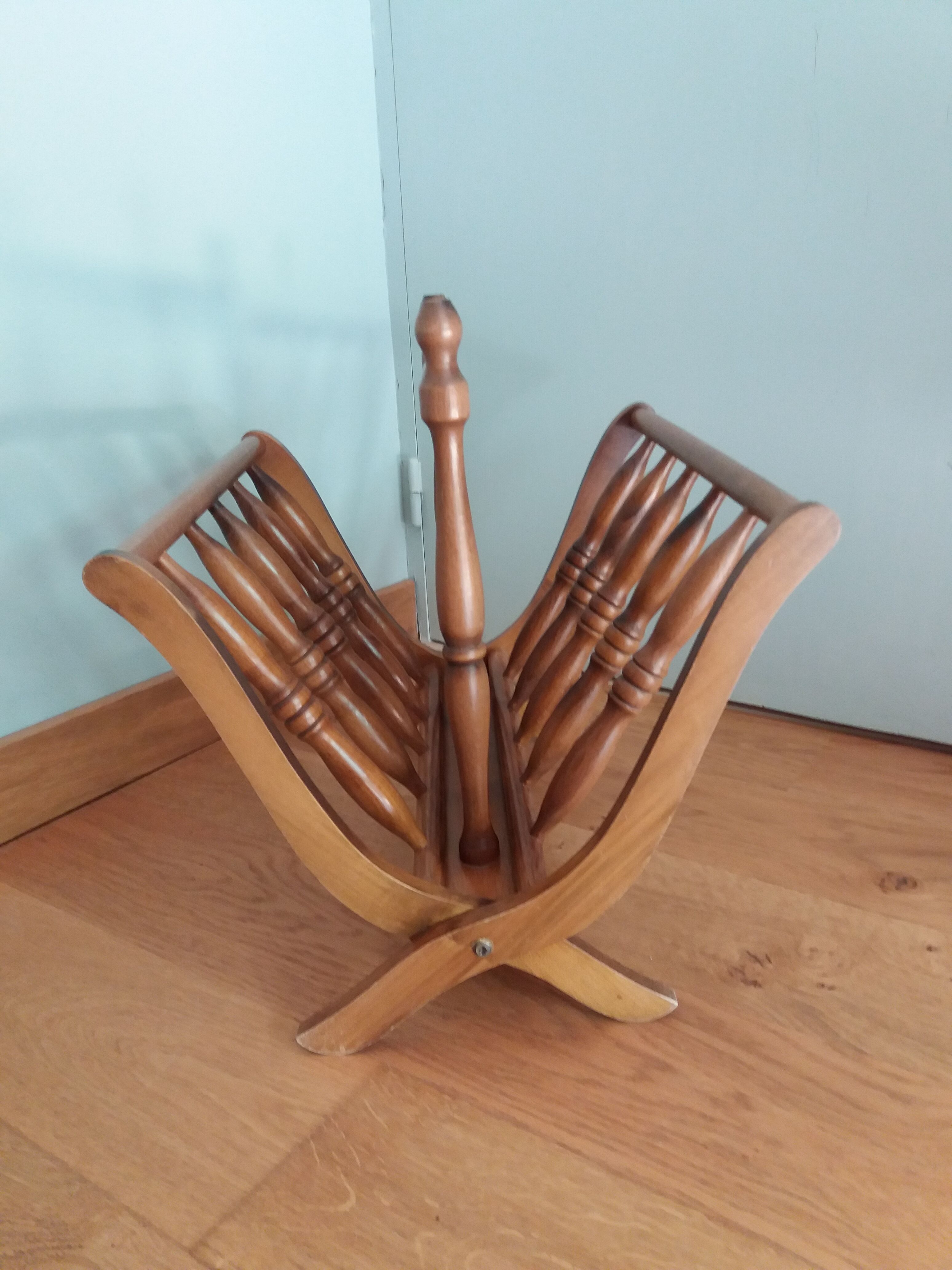 Turned wooden magazine holder