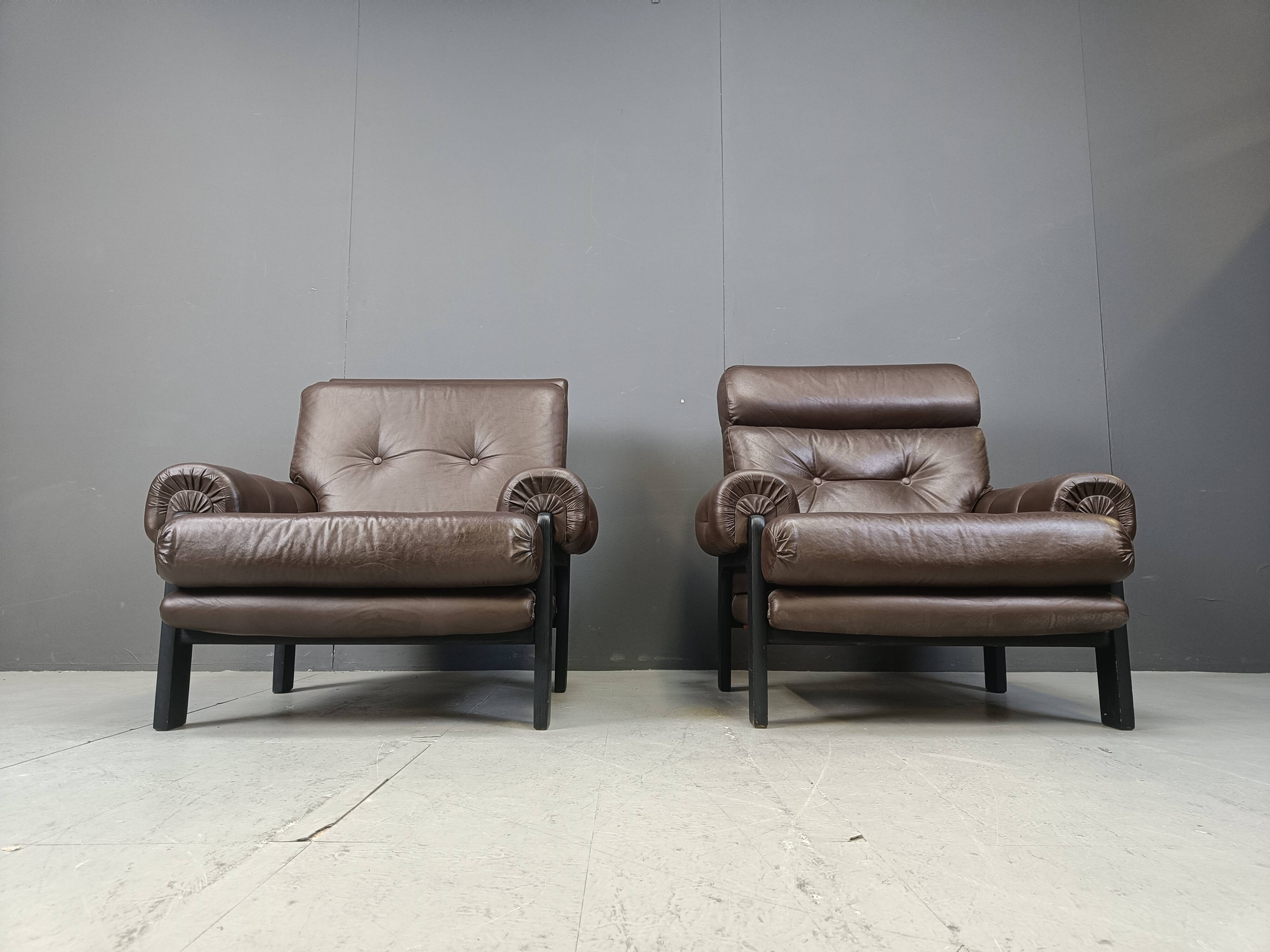 Pair of leather armchairs made in Denmark, 1960s