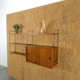 Wall rack with hanging cupboard, shelves and steel holders vintage
