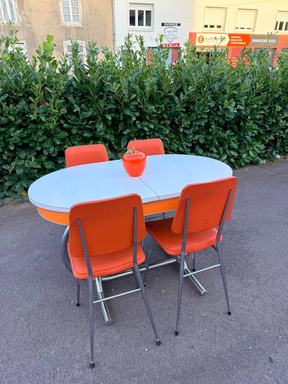Formica leatherette chair with orange table, vintage 70s Space Age