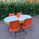 Formica leatherette chair with orange table, vintage 70s Space Age