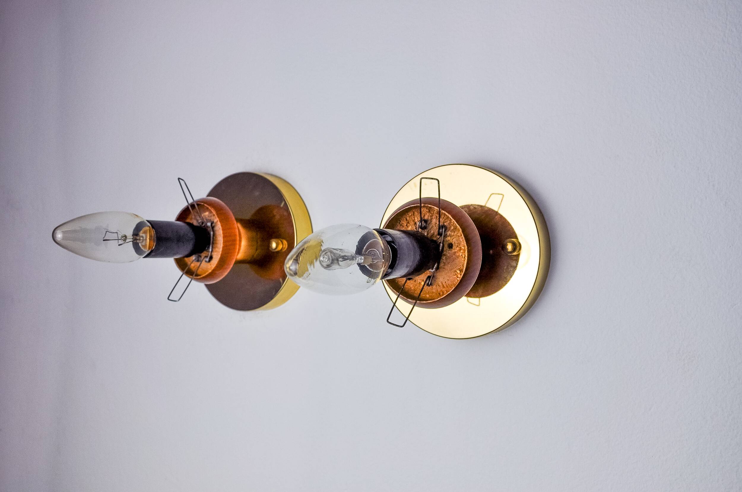 Pair of "cocoon" wall lights, polymer and pine, Italy, 1970