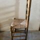 Old turned and stuffed wooden chair