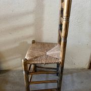Old turned and stuffed wooden chair