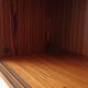 Enfilade wall vitrine in veneered teak from the 1960s.