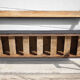 Antique wood bench and black imitation leather