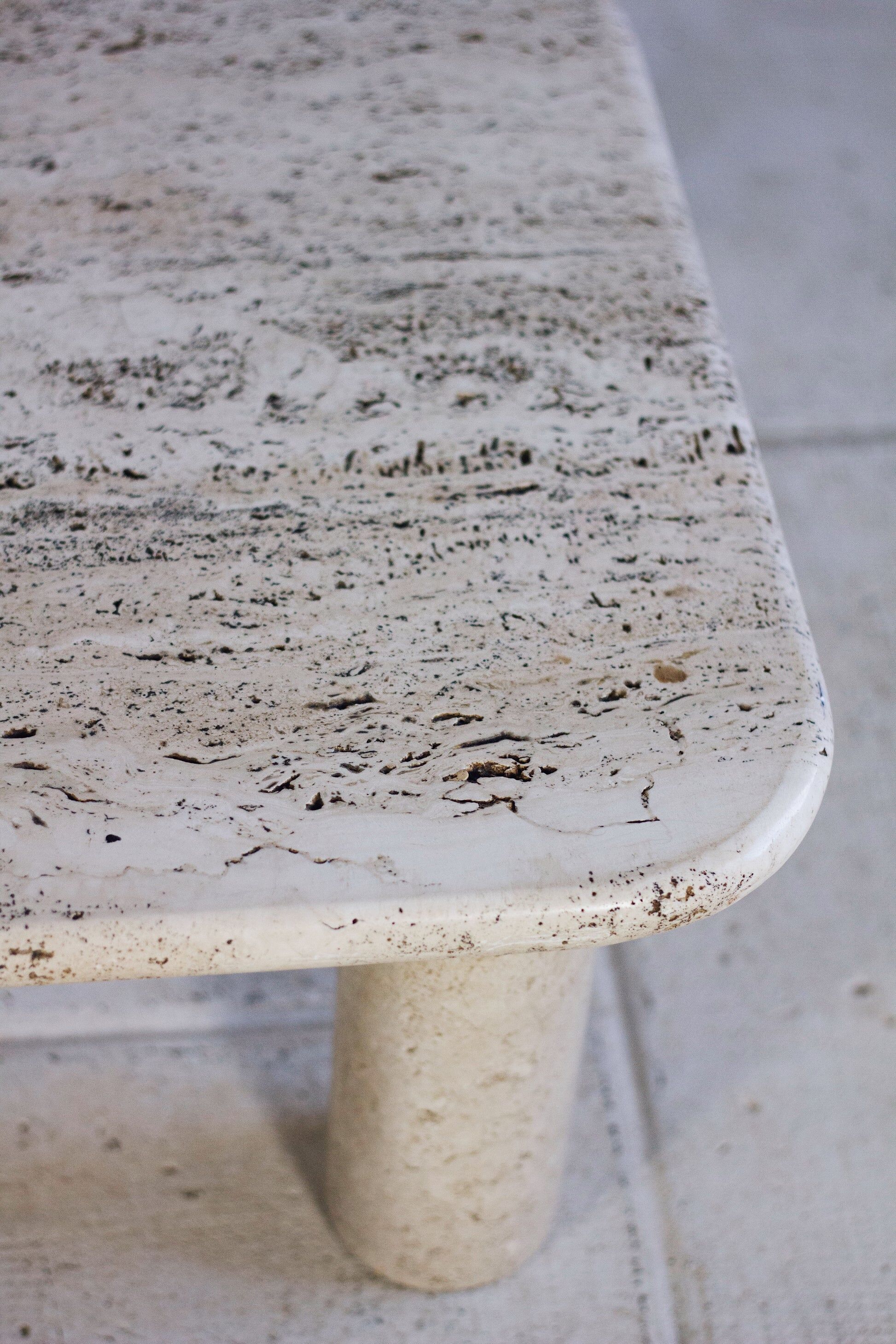 Travertine coffee table in the style of Angelo Mangiarotti, 1970.