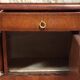 Empire-style bedside table in mahogany