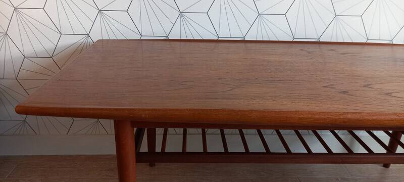 Danish 1960s teak coffee table with slatted shelf.