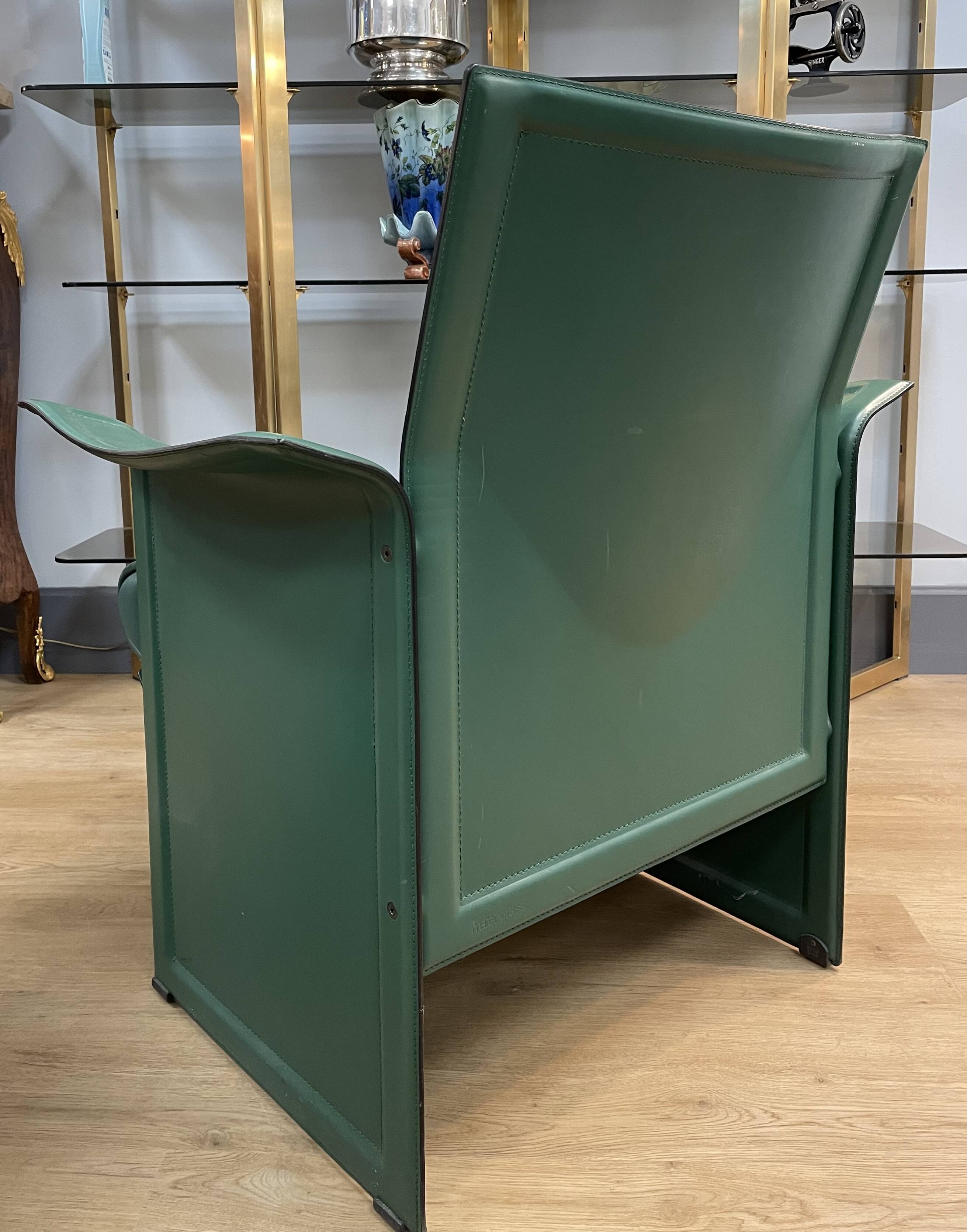 Pair of green leather armchairs from the 70s