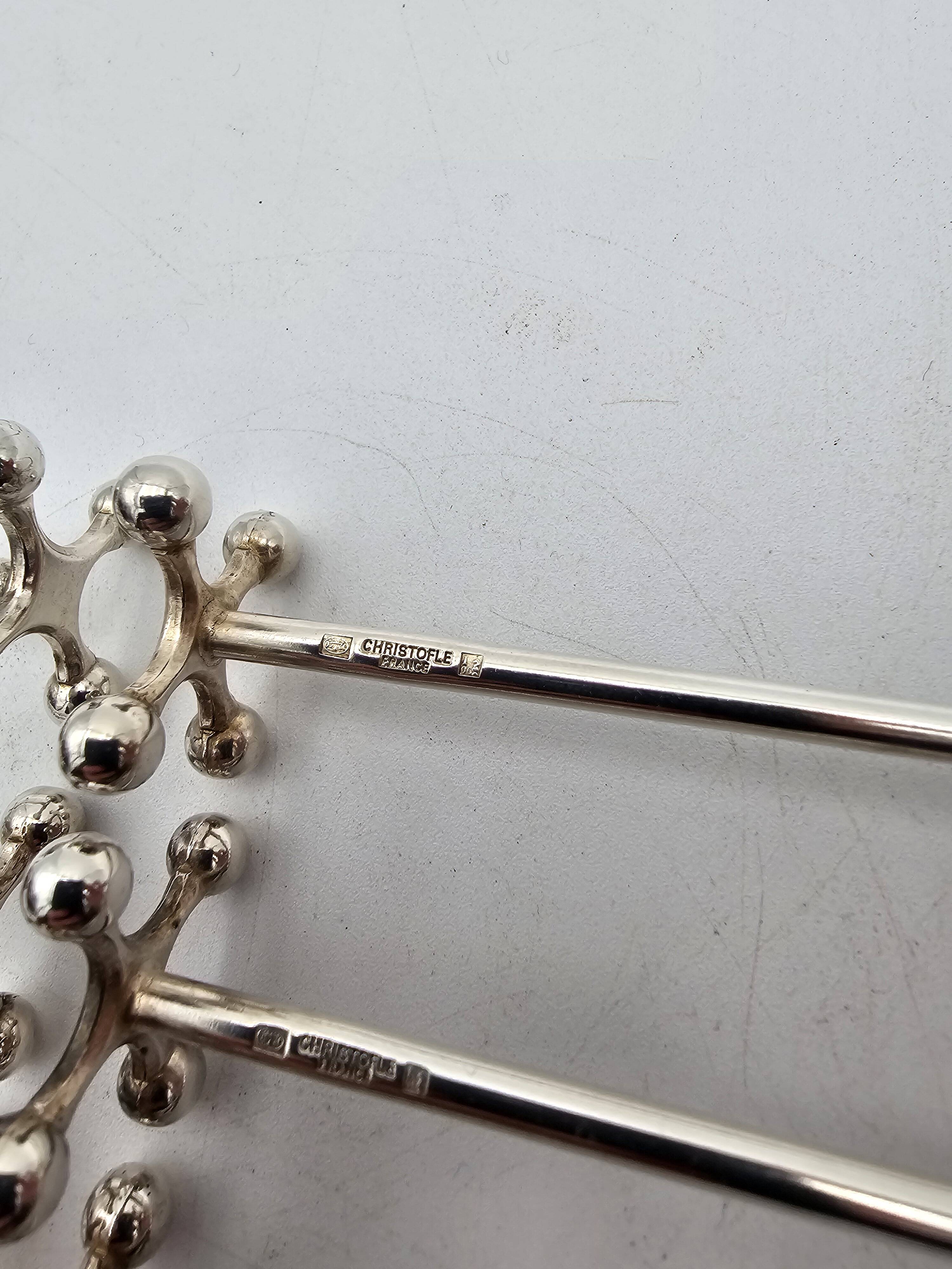 12 Christofle silver-plated knife holders