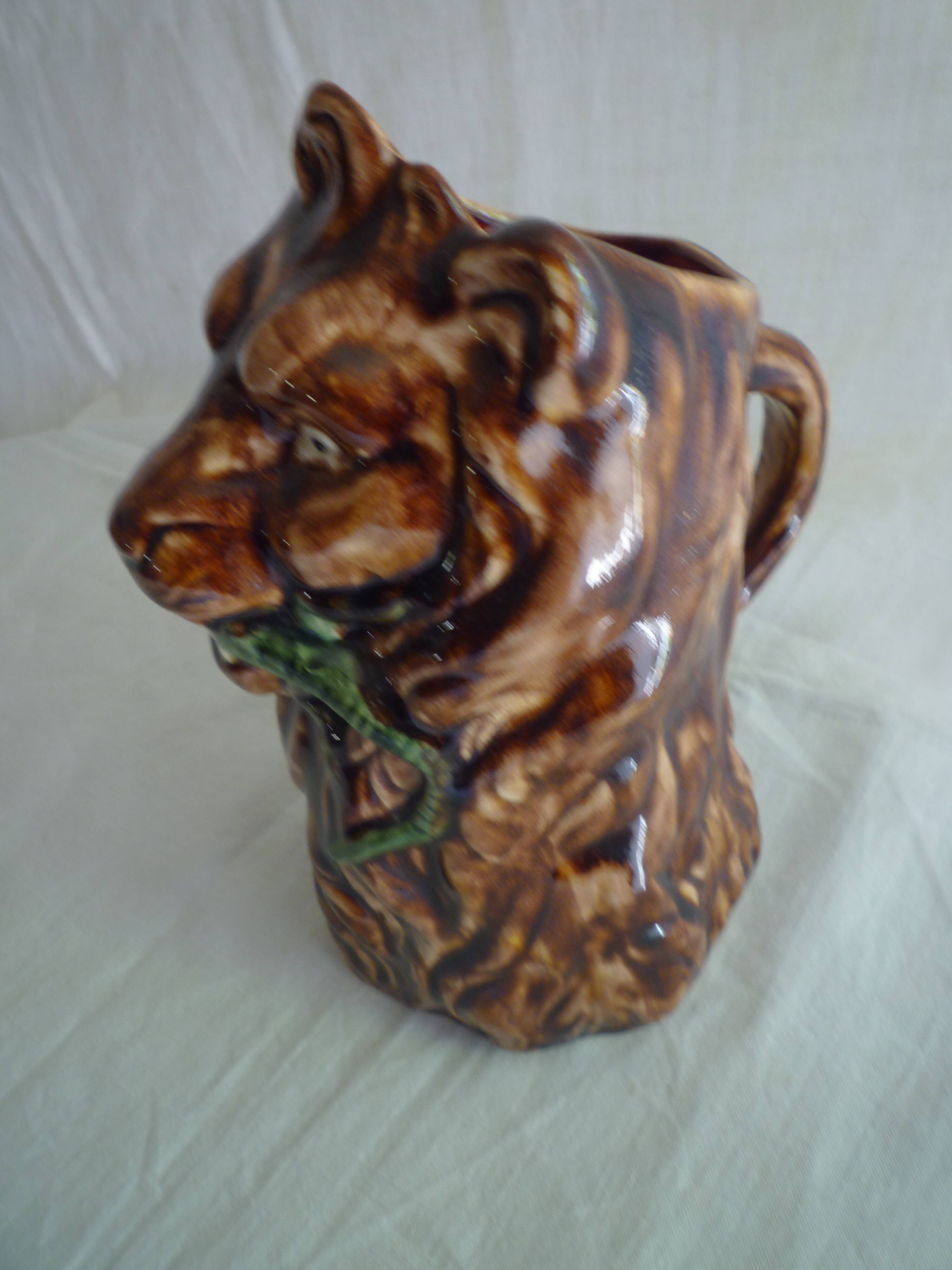 Lion head slip pitcher late 19th century