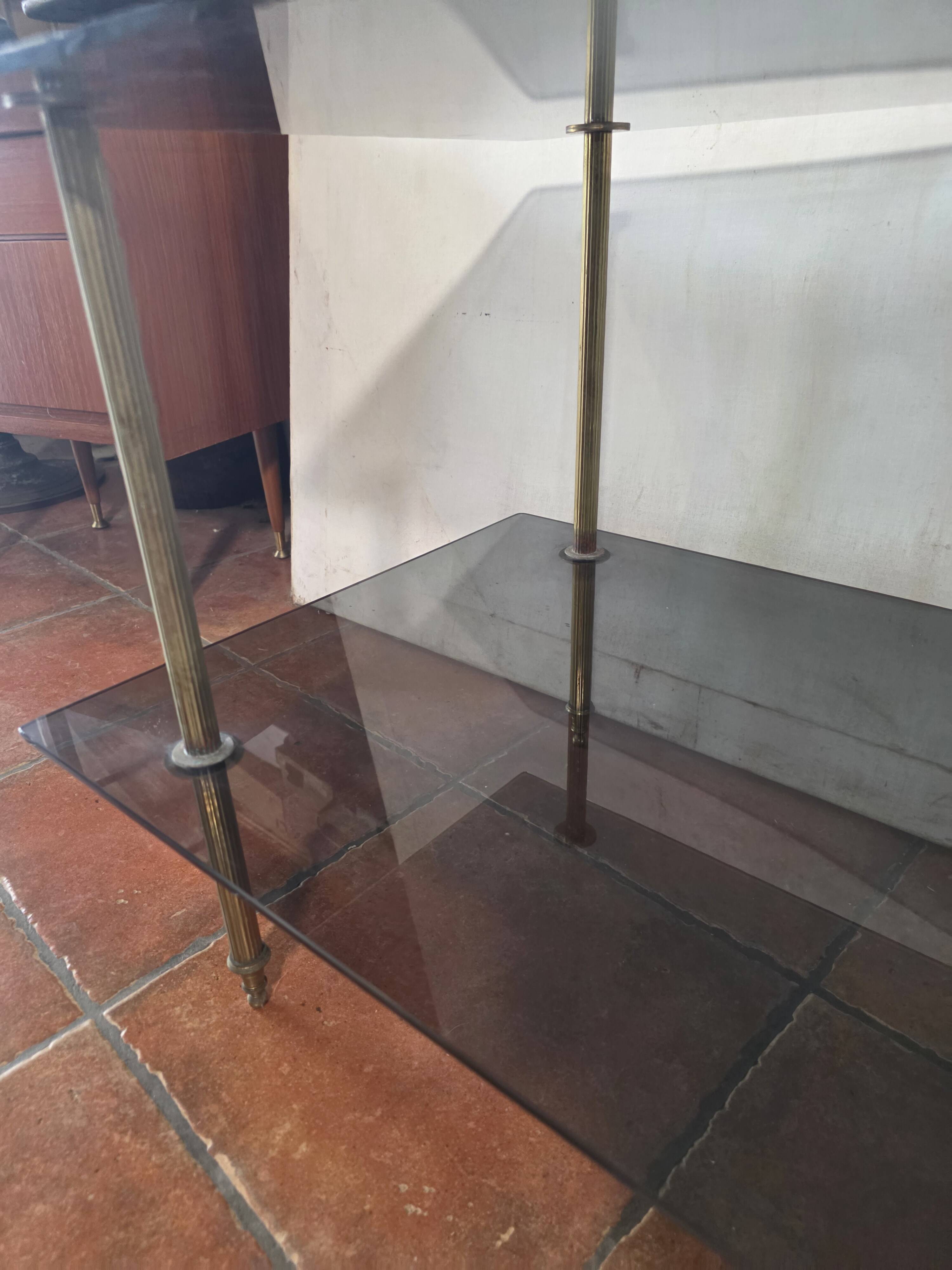 Smoked glass and brass coffee table from the 1970s.