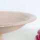 Plat piédouche en céramique rose, 1950