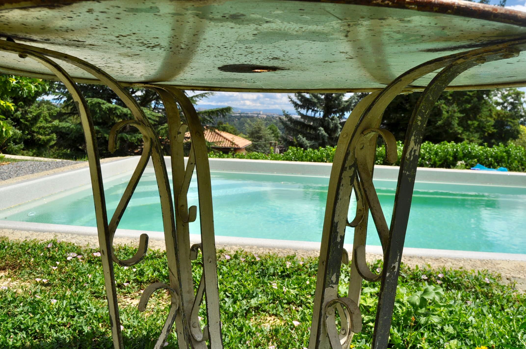 Sheet metal and iron garden table