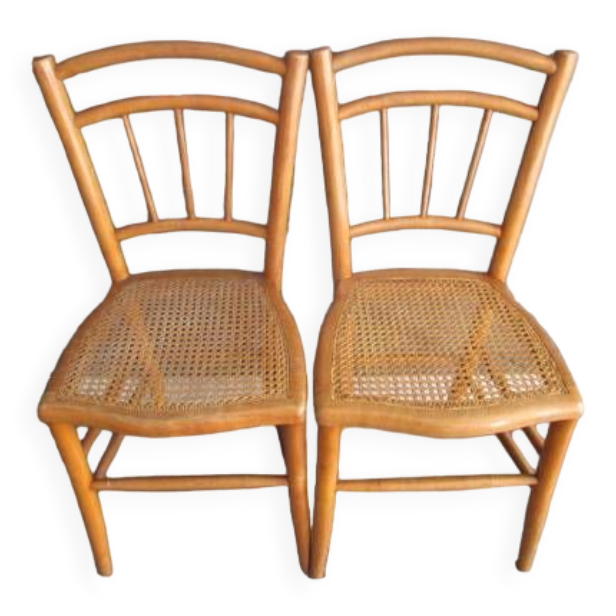Pair of old caned chairs in blond wood