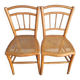 Pair of old caned chairs in blond wood